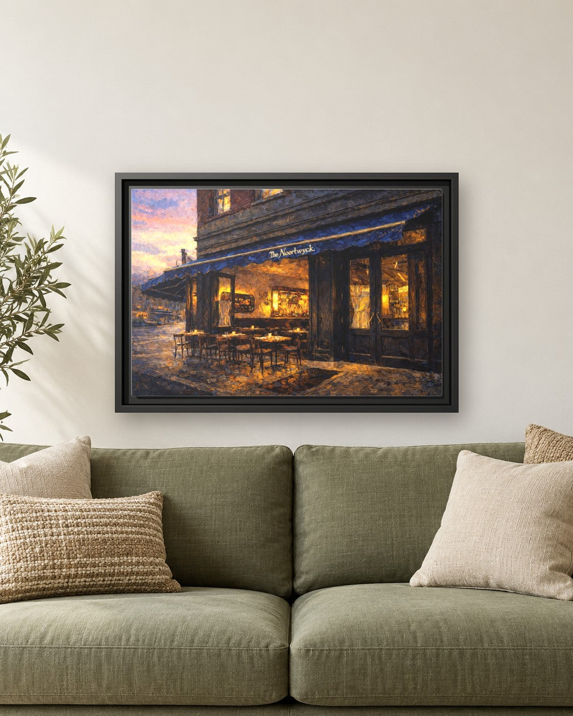 The Noortwyk framed canvas print hanging above a sofa