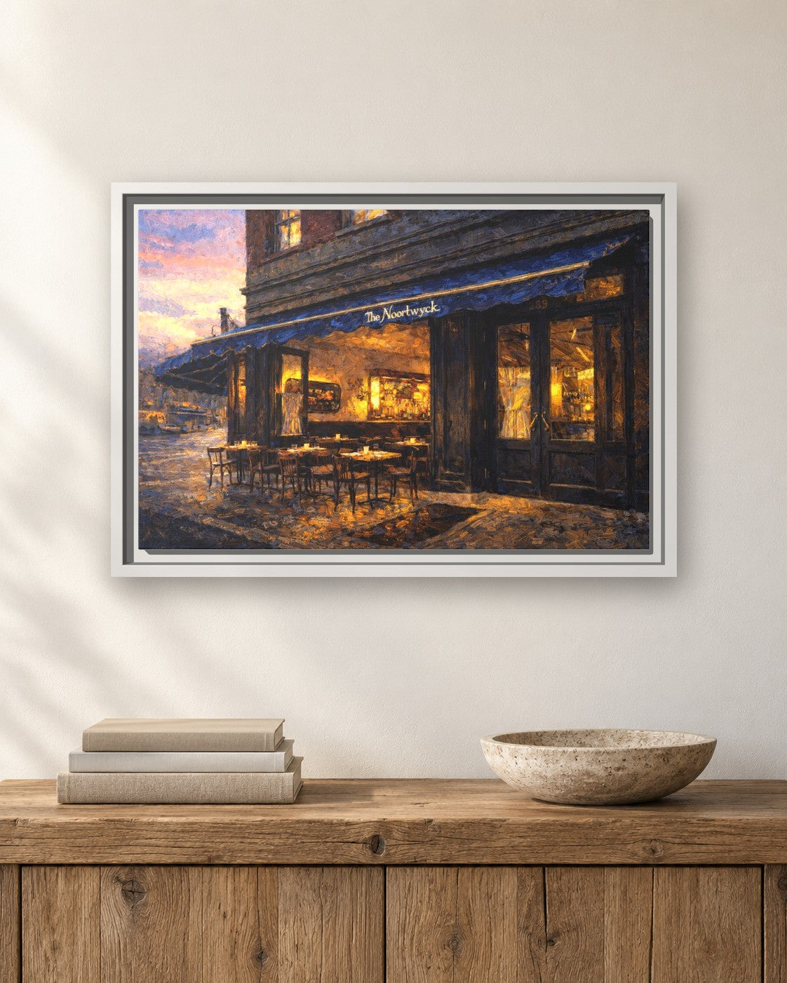 The Noortwyk framed canvas print hanging above a sideboard