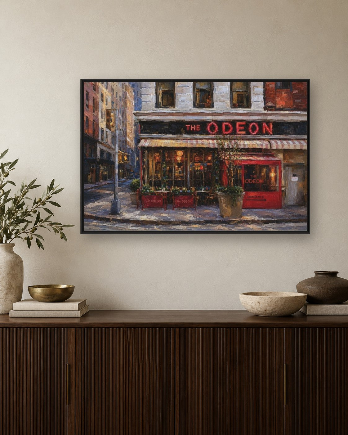 The Odeon framed canvas print hanging above a credenza