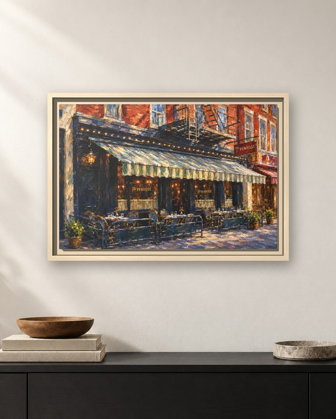 The Penrose framed canvas print hanging above a sideboard