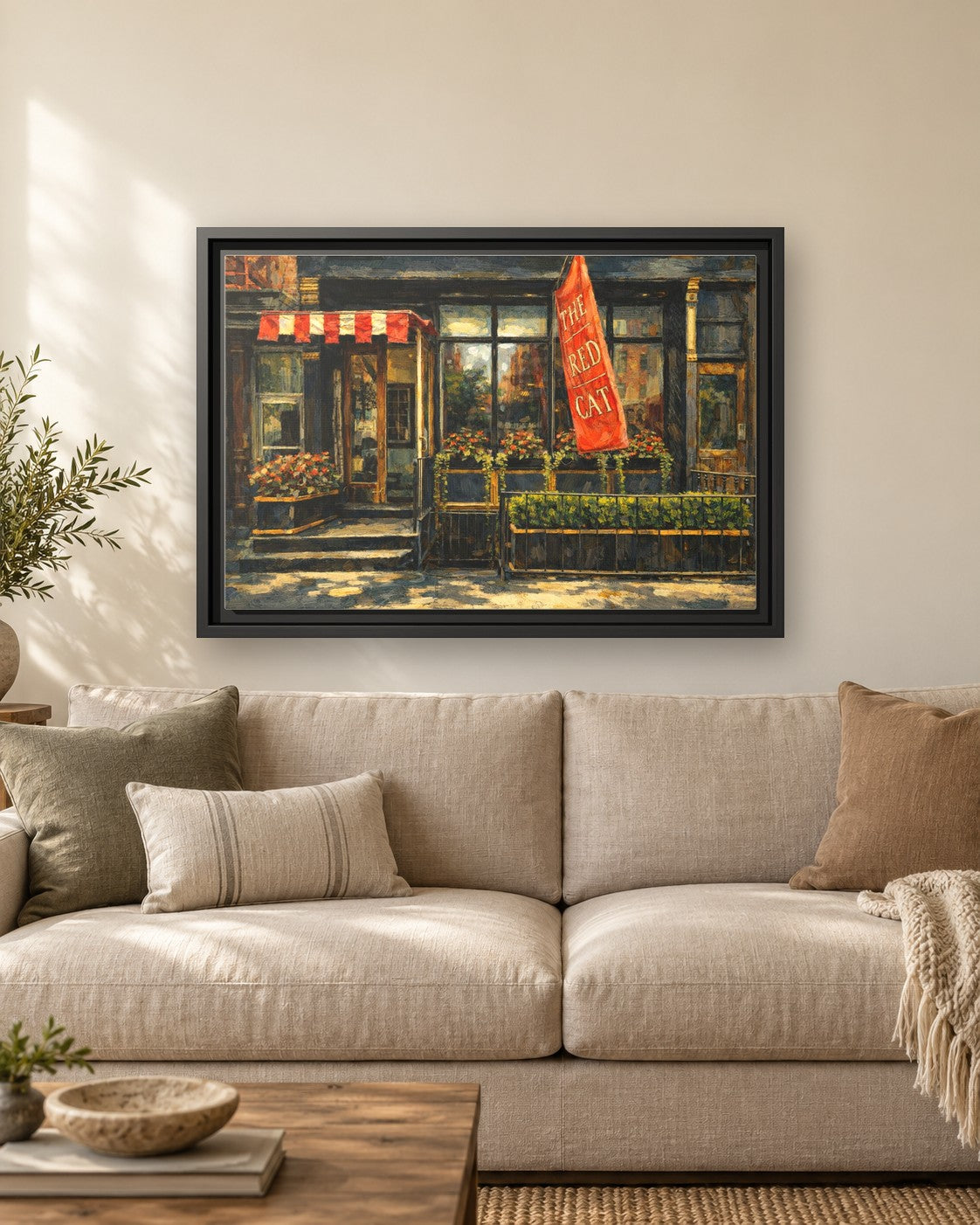 The Red Cat framed canvas print hanging above a sofa