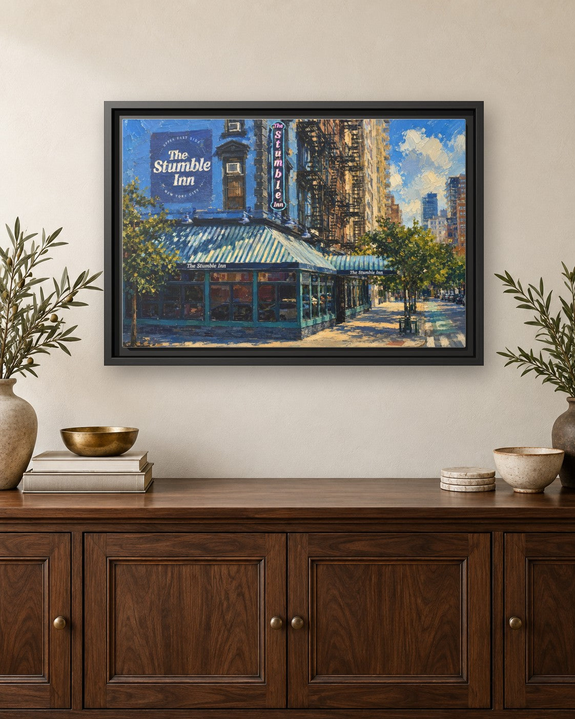 The Stumble Inn framed canvas print hanging above a credenza