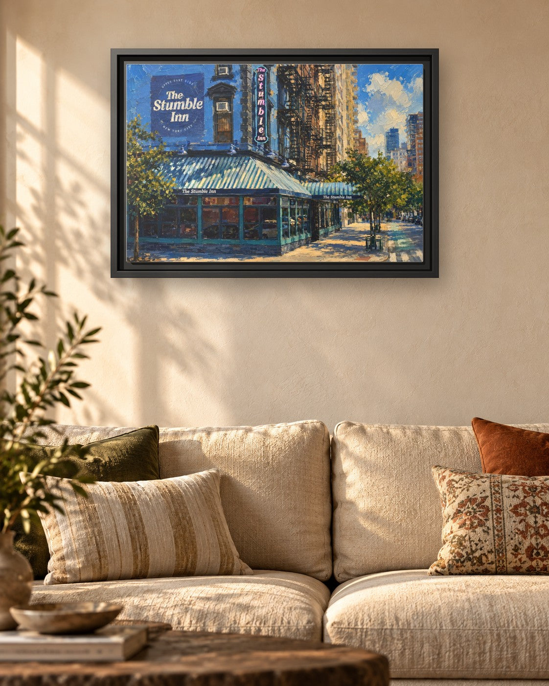 The Stumble Inn framed canvas print hanging above a sofa