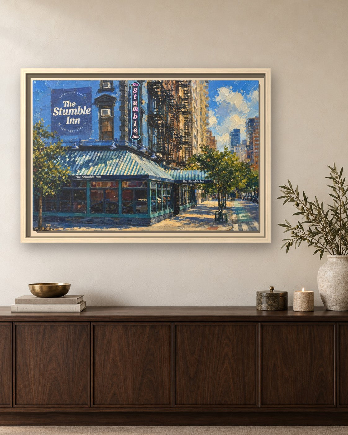 The Stumble Inn framed canvas print hanging above a sideboard