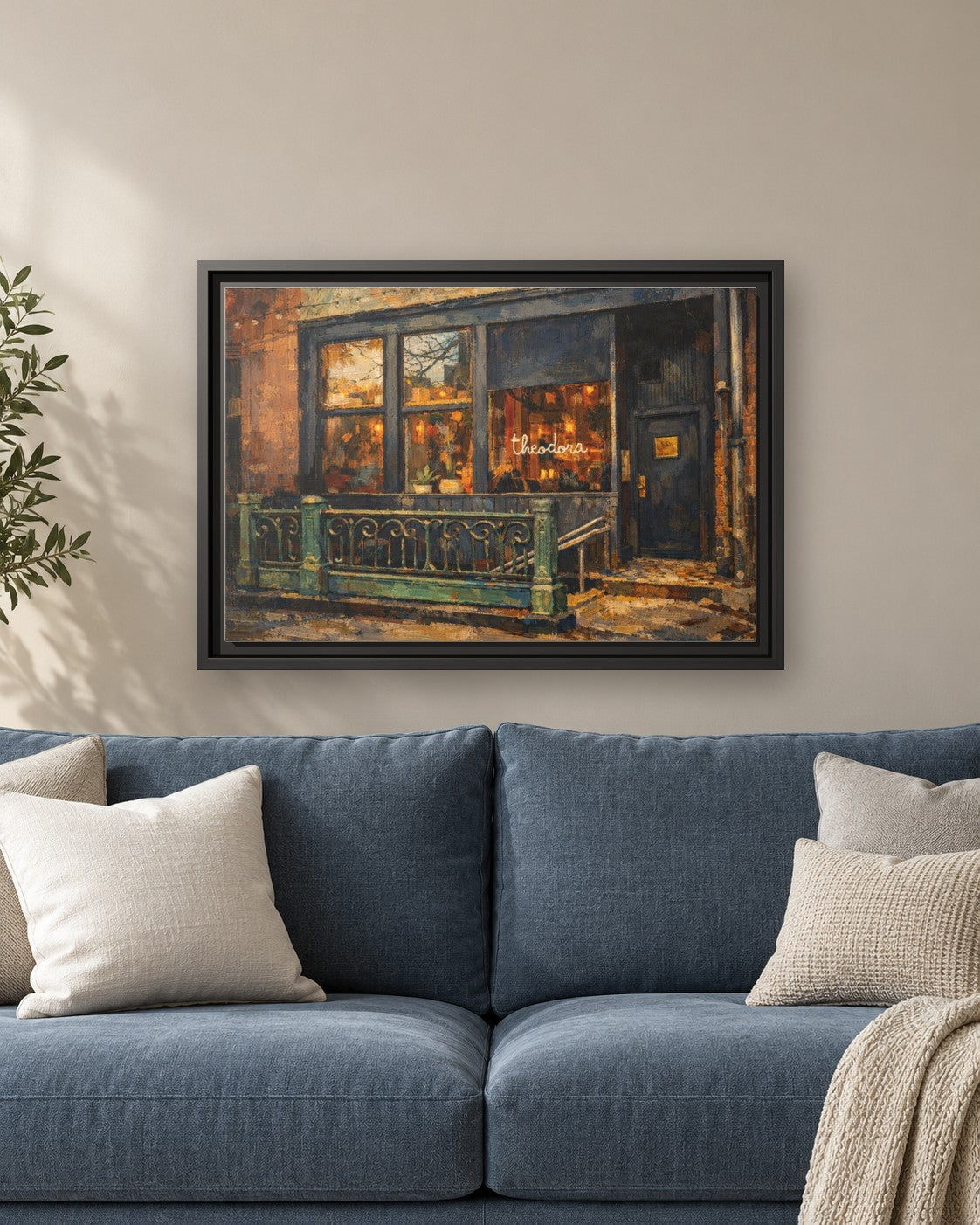 Theodora framed canvas print hanging above a sofa