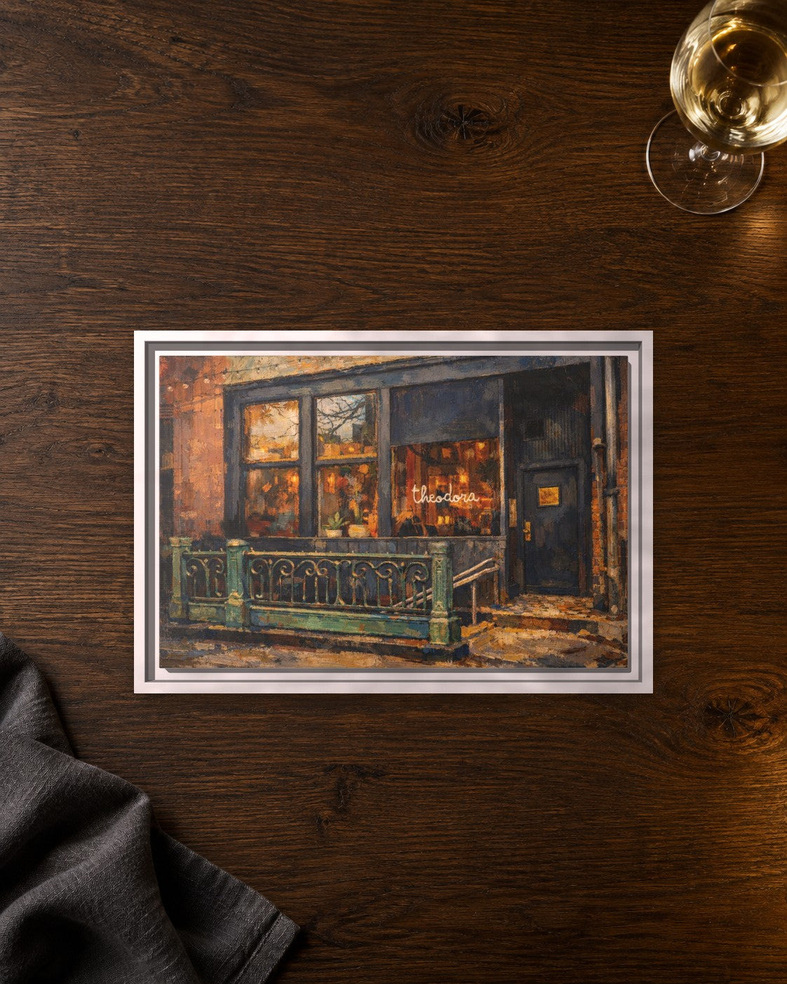 Theodora framed canvas print lying on a table