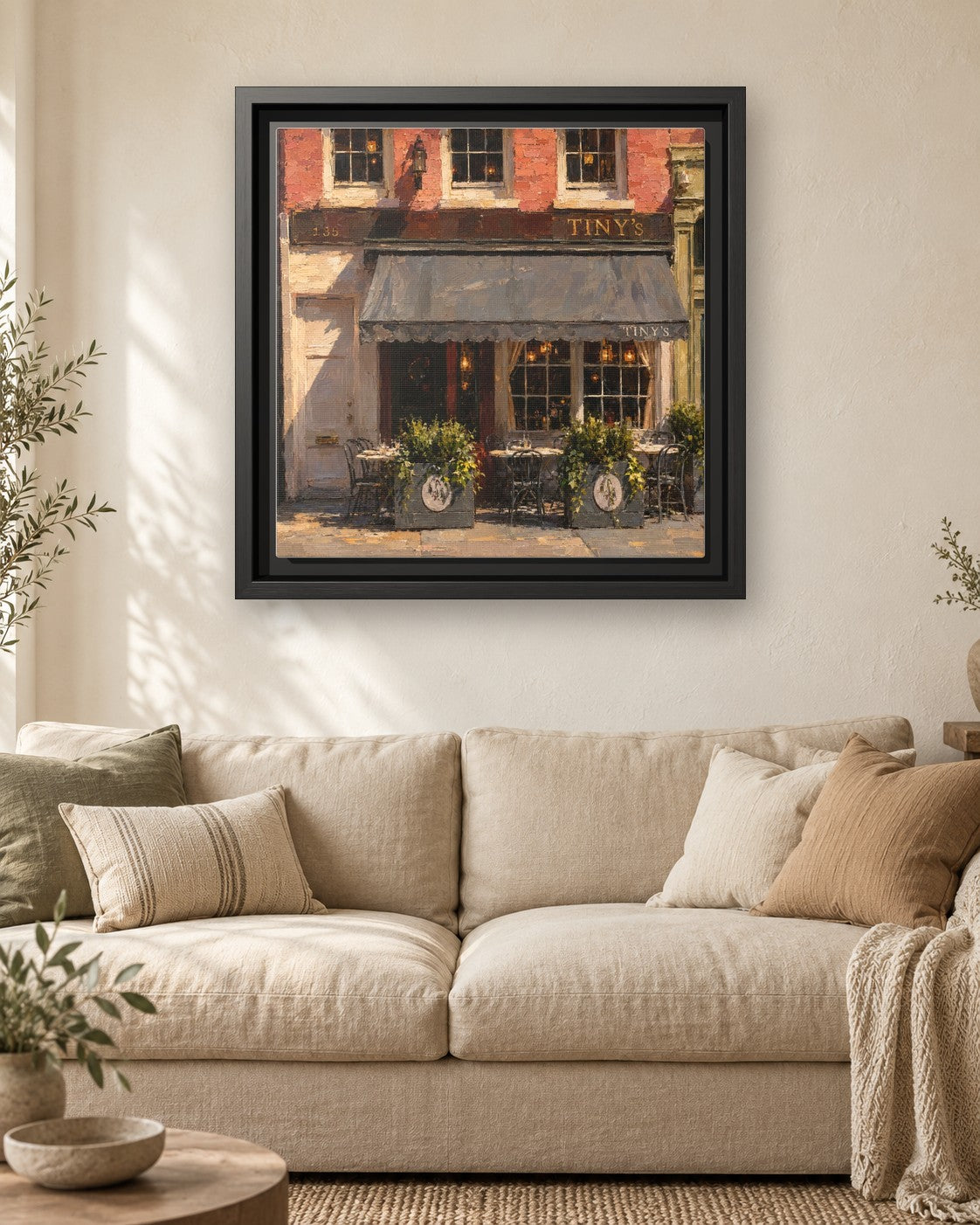 Tiny's & The Bar Upstairs framed canvas print hanging above a sofa