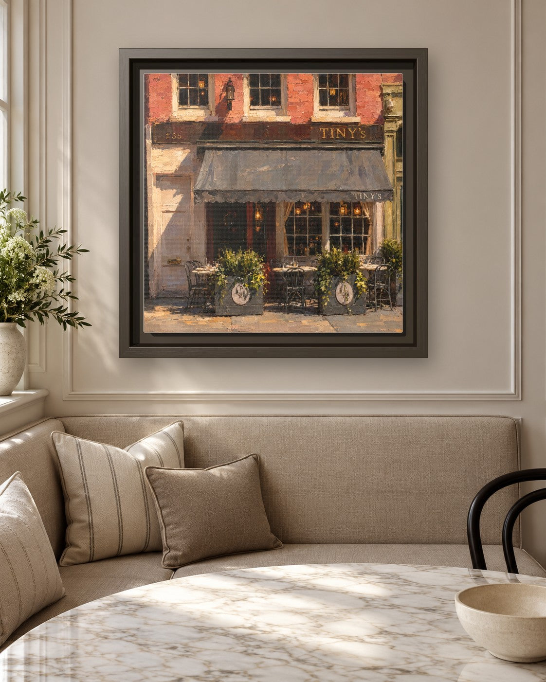 Tiny's & The Bar Upstairs framed canvas print in a breakfast nook