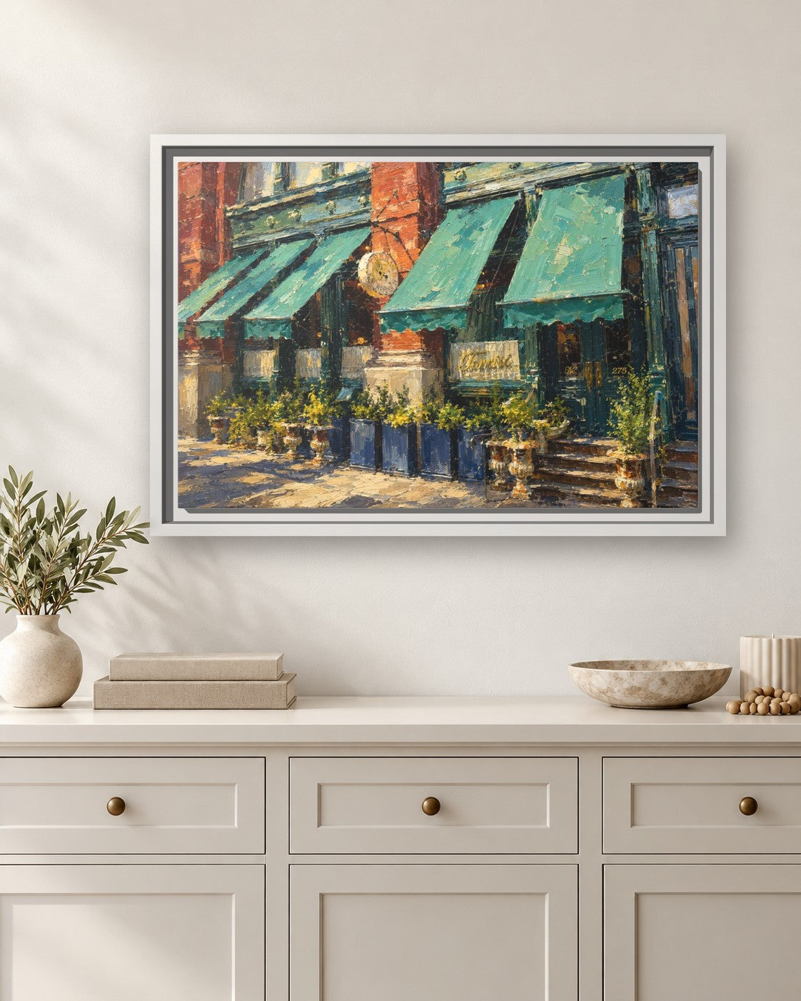 Torrisi framed canvas print hanging above a sideboard