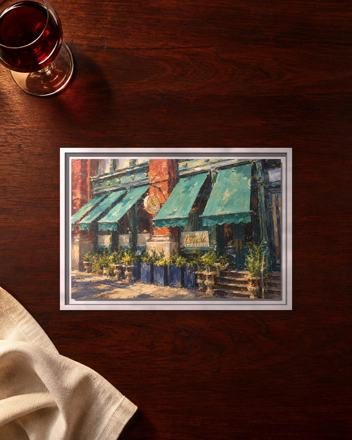 Torrisi framed canvas print lying on a table