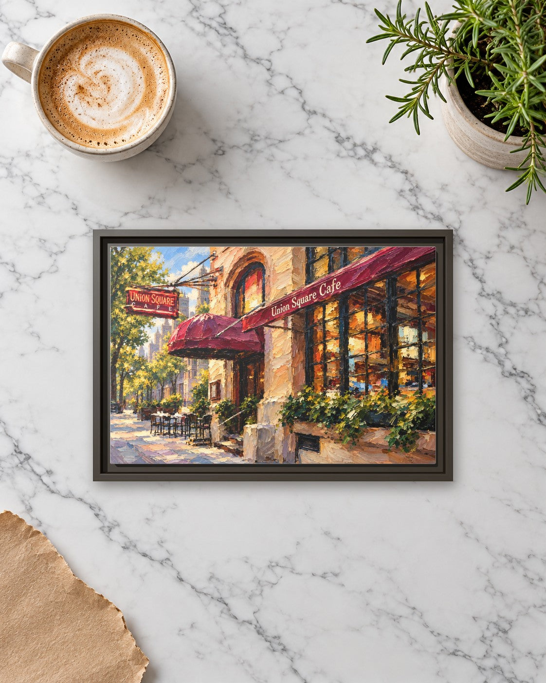 Union Square Cafe framed canvas print lying on a table
