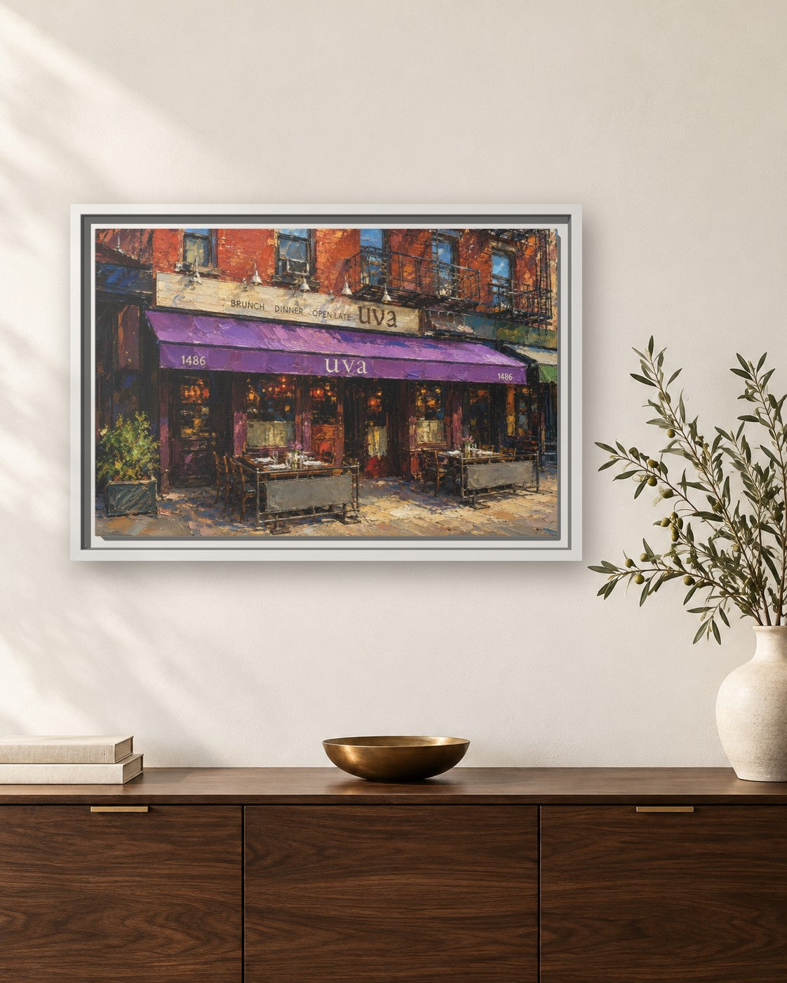 Uva framed canvas print hanging above a sideboard