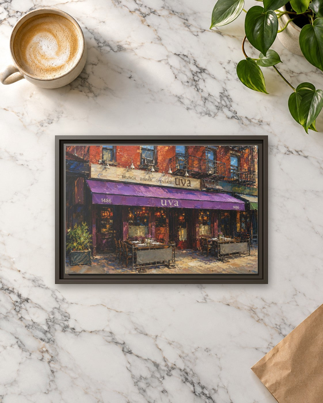 Uva framed canvas print lying on a table