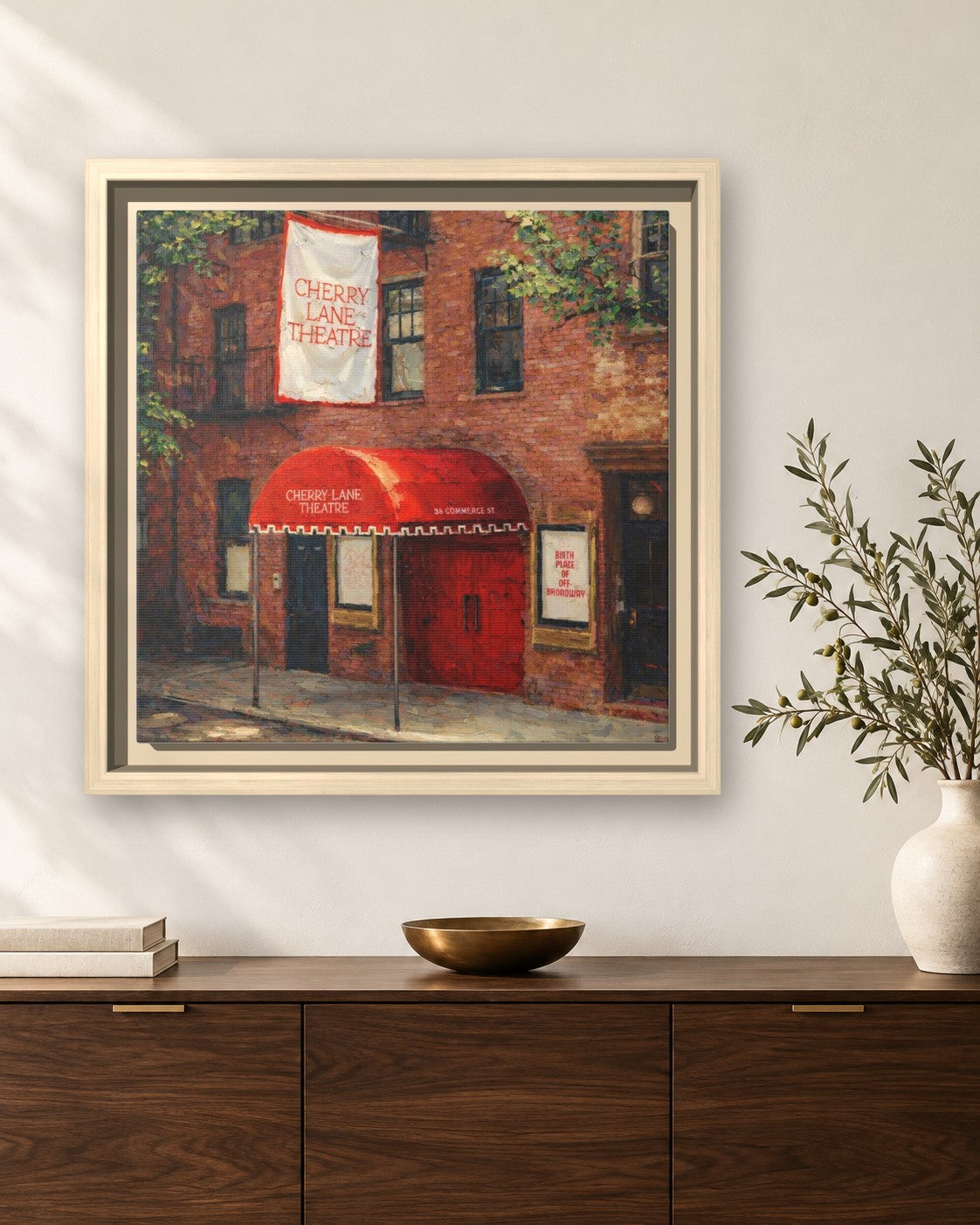Wild Cherry framed canvas print hanging above a sideboard
