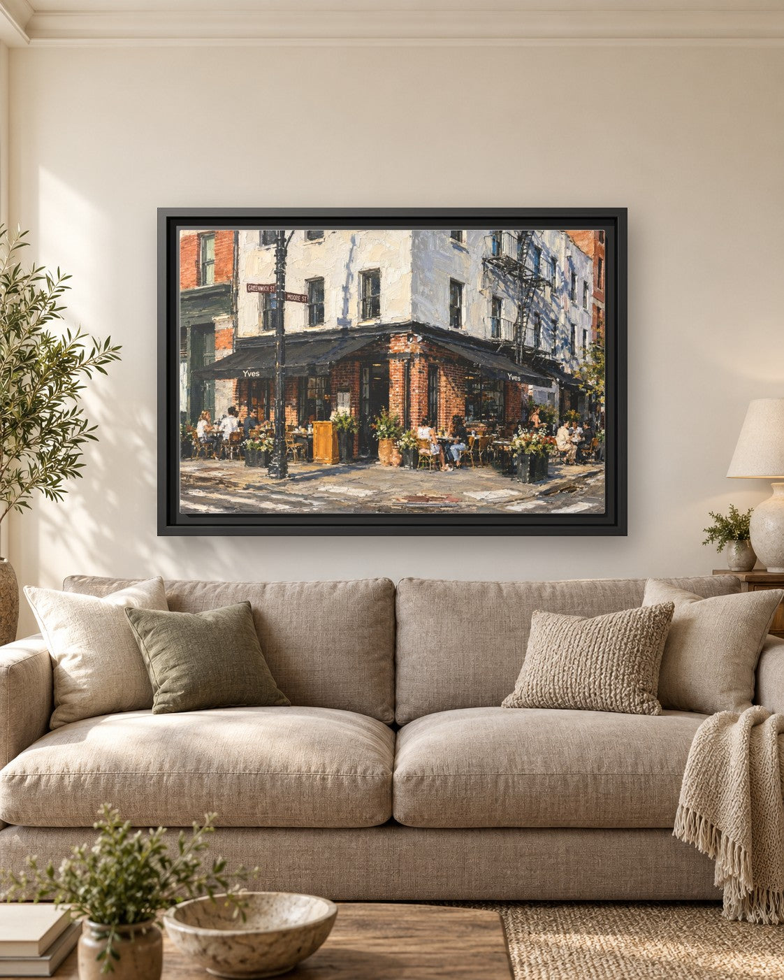 Yves Cafe framed canvas print hanging above a sofa
